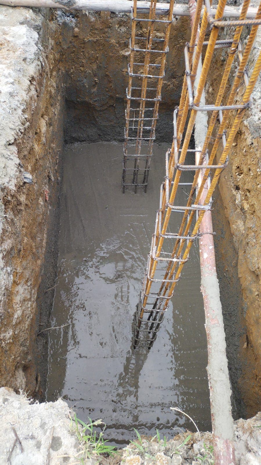 Drilling and placing pile foundations